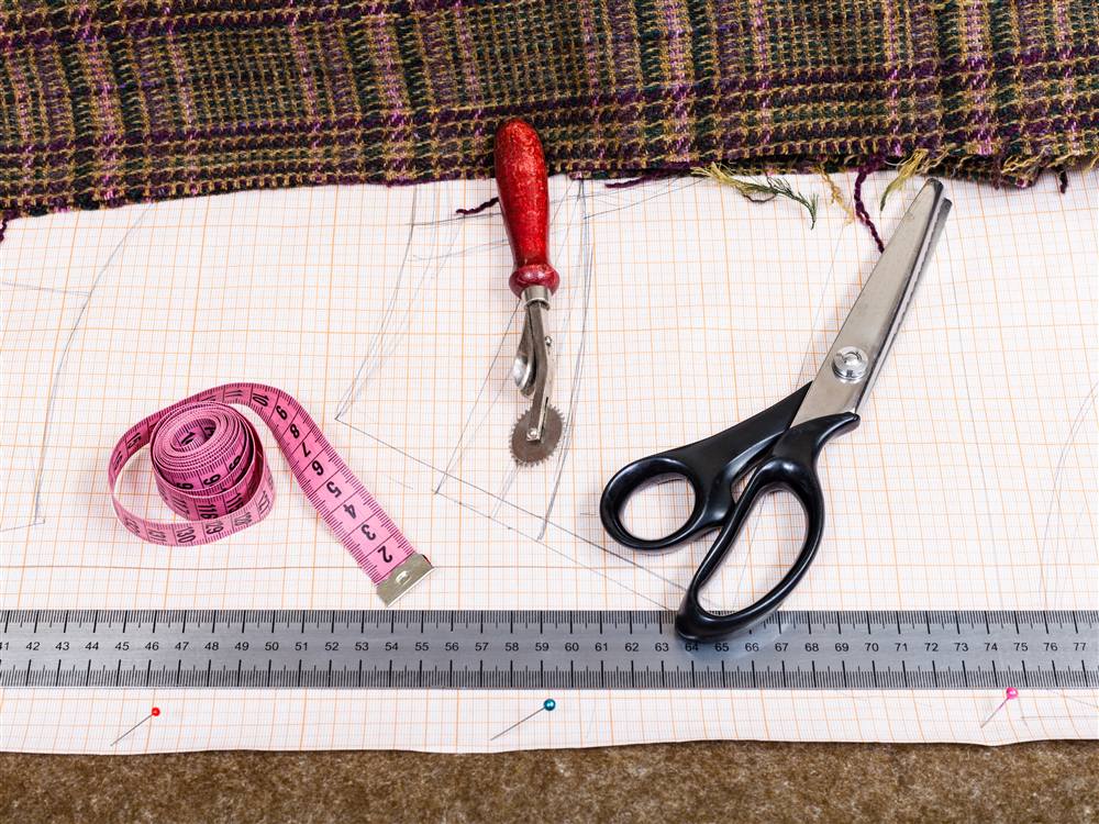Fabric pattern, measuring tape, and sewing scissors
